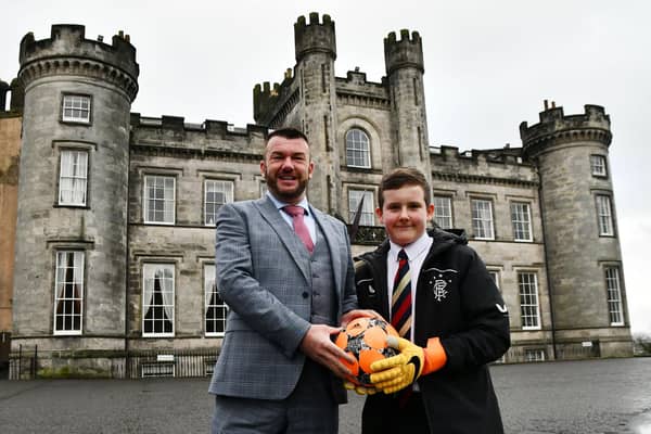 Jordon Robertson, 12, with Steven McLeod, owner of Airth Castle Hotel & Spa, who is funding his soccer academy trip to Abu Dhabi