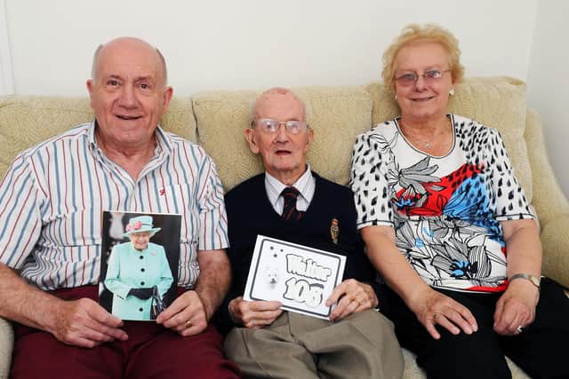 Walter Sharp pictured last August on his 105th birthday with son Brian and daughter-in-law Catherine Sharp