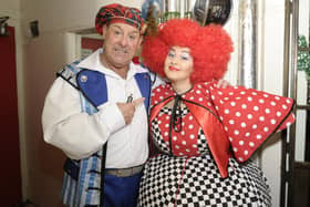 Andy Gray as Buttons and his daughter Clare as a Wicked Sister meet backstage during Cinderella at the King's