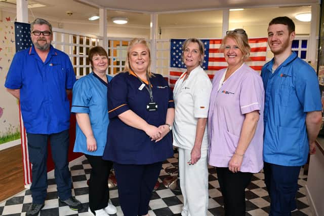 Some of the staff at Thornton Gardens, from left, Paul Murphy, senior social care worker; Suzanne Wilkinson, social care worker; Sharon Brownlee, manager; Liz Gordon, cook; Helen Risk, house keeper and Darren Lindsay, social care worker.   (Pic: Michael Gillen)