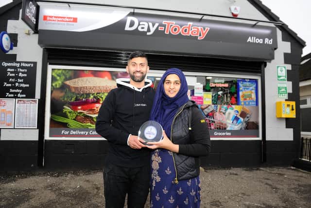 Jawad and Asiyah Javed, owners of Day-Today in Stenhousemuir, received Good Morning Britain's Community Award for the ways in which they've helped those in need throughout the pandemic. Picture: Michael Gillen.
