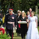 Bo'ness Fair Queen Ellie Van Der Hoek and the Lord Lieutenant Alan Simpson in the procession to the grave of Private Michael Muldoon