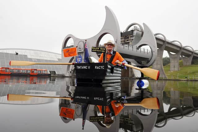 Major Mick, aka retired Scots Dragoon Guards Major Michael Stanley, paddles his new and improved Tintanic II at the Falkirk Wheel