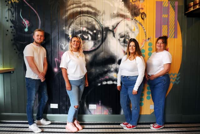 At the launch of  Sal's Famous. New Pizzeria  -Blair Nisbet, supervisor; Indiana Aitken, manager; Chelsea MacDonald, assistant manager and Leda Sweeney, head cook. Mural by Michael Corr. (Pic: Michael Gillen)