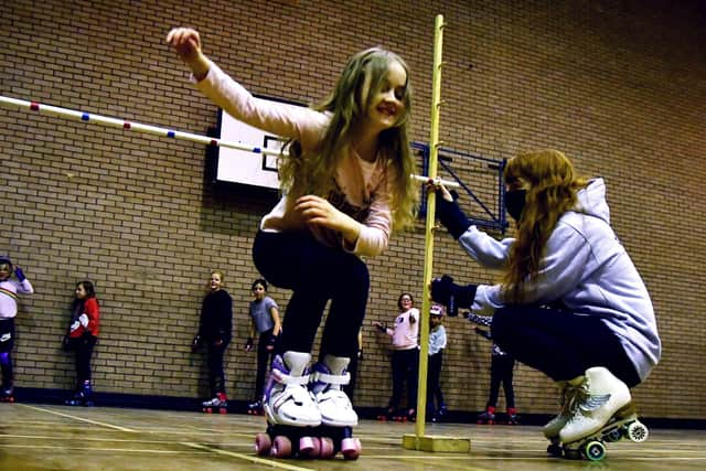 Forgetting their responsibilities for a while the young carers enjoy roller skating