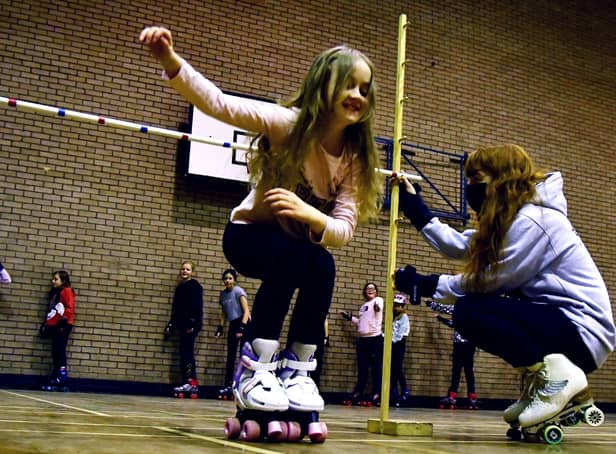 Forgetting their responsibilities for a while the young carers enjoy roller skating