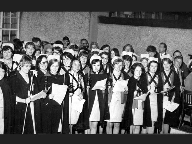 Falkirk Infirmary nurses sing carols round the wards in the 1960s.