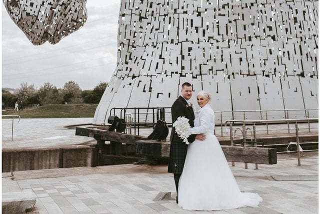 The couple had been due to marry on July 17 last year which would have been the 15th anniversary of them getting together. However, flooding at Beancross Farm meant they had to postpone until this year but the wedding went ahead at the venue on May 7. Pictured here beside the Kelpies.