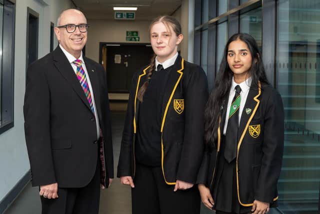 Grangemouth High School head teacher Brian Millar with the school Dux for 2025/26 Sarah Lochrie and Proxime Accessit Vennela Ginna (Picture: Submitted)