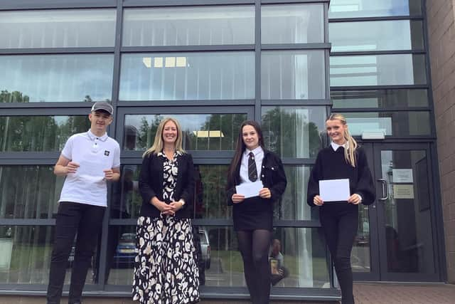 Pupils David Hogg, Niamh Alldred and Naomi Meikle, with Boness Academy headteacher Catriona Reid.