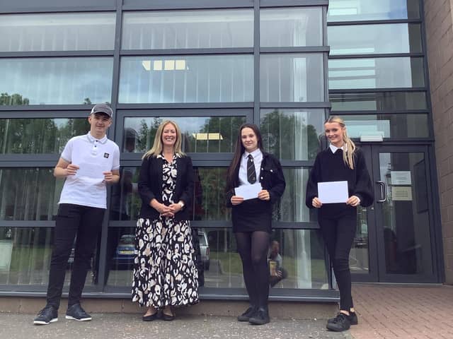 Pupils David Hogg, Niamh Alldred and Naomi Meikle, with Boness Academy headteacher Catriona Reid.