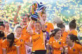 Leanne Ross  lifts the SWPL trophy as Glasgow City secured an incredible 14th consecutive title (Photo by Mark Scates / SNS Group)