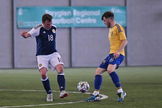 A charity football match between Scotland and Ukraine fans in March. Stock pic by John Devlin.