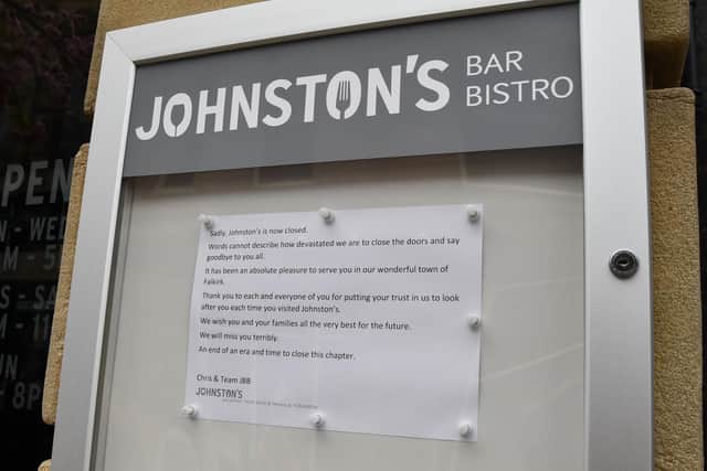 The sign telling customers Johnston's Bar Bistro is now closed