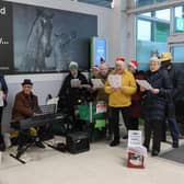 Carols were being sung in Grangemouth's Asda store on Saturday by members of local churches.  (Pic: Scott Louden)