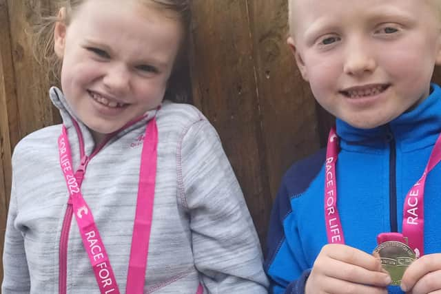 Rosie and Murray with their medals.