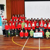 St Francis Xavier's RC Primary School cheque presentation to SCIAF. Pic: Michael Gillen