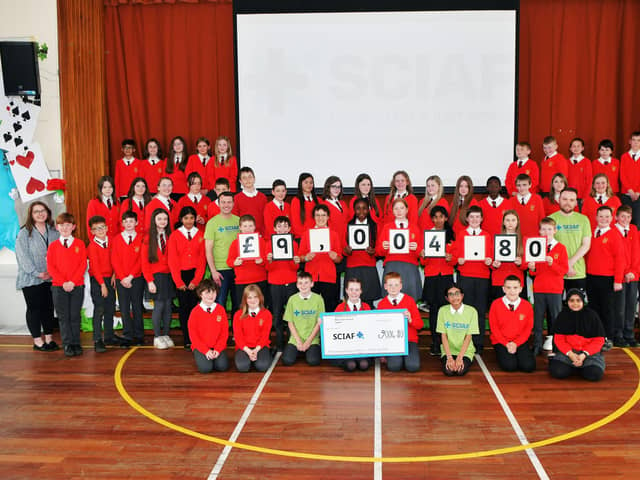 St Francis Xavier's RC Primary School cheque presentation to SCIAF. Pic: Michael Gillen