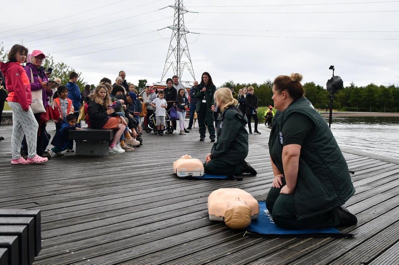 Lots of interested youngsters as Scottish Ambulance Service staff give a CPR demonstration