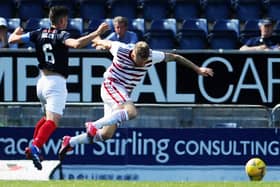 The unfortunate moment that turned the game - Gary Miller of Falkirk is about to be dismissed for a pull on Accies sub Andy Ryan, which led to Ronan Hughes converting a penalty kick (picture by Michael Gillen).