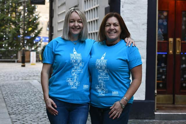 Sharon Crozier and Jane White, from the Tolbooth Tavern, wearing the Falkirk Pub Trail t-shirts.  Picture: Michael Gillen.