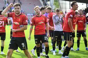 Ross MacIver (1st left) celebrates with his Falkirk team-mates after Saturday's 2-0 win at Dunfermline Athletic (Pic Michael Gillen)