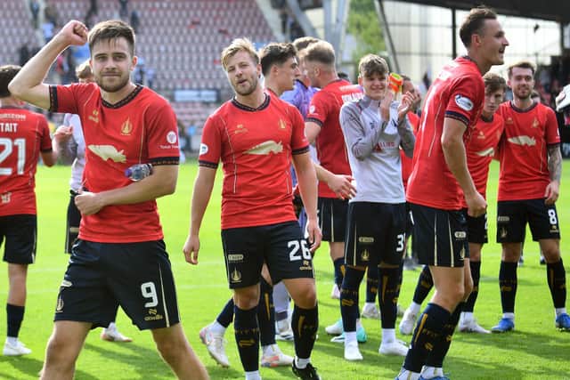 Ross MacIver (1st left) celebrates with his Falkirk team-mates after Saturday's 2-0 win at Dunfermline Athletic (Pic Michael Gillen)