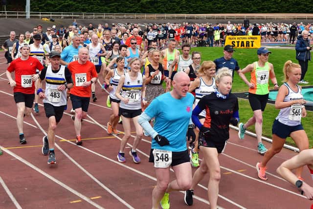 Runners make their way around Grangemouth Stadium's circular track on Sunday as the Round the Houses 10k Jim Dingwall Memorial road race got underway (Pics by Michael Gillen)