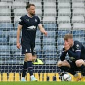 A crestfallen Coll Donaldson alongside centre-half partner Brad McKay after the third goal for ICT (Pics by Michael Gillen)