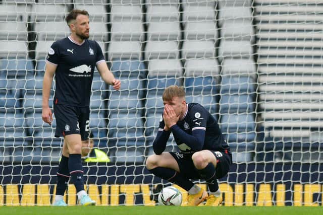A crestfallen Coll Donaldson alongside centre-half partner Brad McKay after the third goal for ICT (Pics by Michael Gillen)