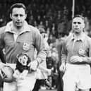 MYSTERY PLAYER: Who is this former Ireland and Lions captain, seen left with mascot (Photo: Getty Images)