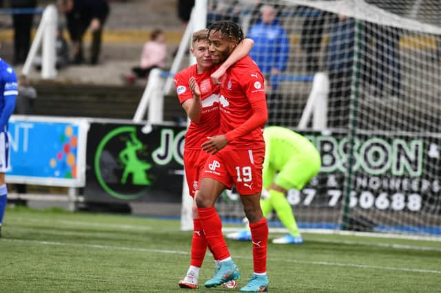 Rumarn Burrell celebrates scoring in 3-1 win at Queen of the South