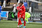 Rumarn Burrell celebrates scoring in 3-1 win at Queen of the South