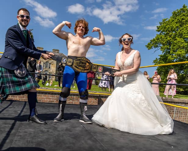 Andrew and Robyn Petersen in the ring with PWR Pro Heavyweight Champion, Frank Gallo. Pic: Pearl & Plum