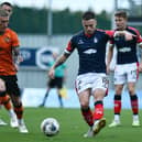 Craig Sibbald and Gary Oliver in action earlier this campaign (Photo: Michael Gillen)