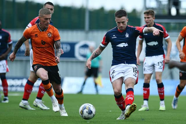 Craig Sibbald and Gary Oliver in action earlier this campaign (Photo: Michael Gillen)