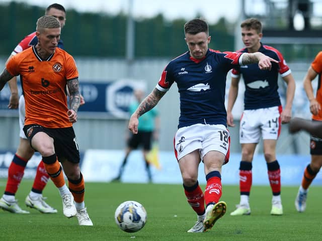 Craig Sibbald and Gary Oliver in action earlier this campaign (Photo: Michael Gillen)