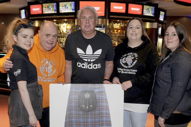 Gus Michael (centre), DJ at Sportsters in Falkirk, says he and fellow staff have received little financial assistance from the Scottish Government amid the coronavirus pandemic. Picture: Michael Gillen.