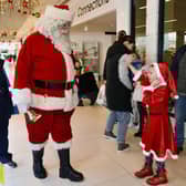 Santa was in town at the weekend for the opening of his post office on the High Street and his grotto in the Howgate.  Pic: Michael Gillen.