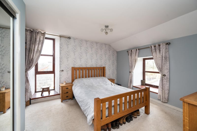 One of the five bedrooms on offer in this eye-catching home