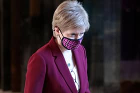 First Minister Nicola Sturgeon has told Scots she is “truly sorry” for mistakes her administration has made, after the UK’s coronavirus death toll surpassed 100,000 on Tuesday.
(Photo by Andrew Milligan - Pool/Getty Images)