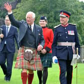 King Charles waves to members of the public who gathered at Kinneil House on Monday afternoon for his visit.  (Pics: Michael Gillen)