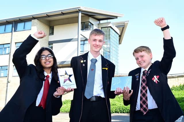 Braes High pupils celebrate their national award, left to right: Braes High pupils Shafa Mohammad (S3), Colin Morrison (S5) and Douglas MacPherson (S4). Pic: Falkirk Council