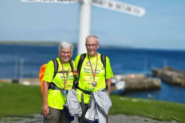 Shona and Michael Hamilton reach their destination of John O'Groats. Pic: Contributed