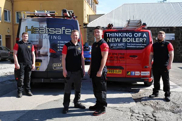 Heatsafe Heating Ltd directors Dougie Hunter and Graeme Hillier celebrate 10 years in business with apprentices Marc Welch and Harry Nixon