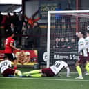 Stenhousemuir’s players watch on as Robert Jones’ late equaliser for Elgin City flies into the back of the net (Photo: Alan Murray)