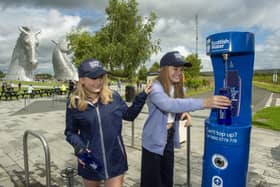 Lucy and Hannah Lironi help launch Scottish Water’s latest tap at the Helix Park in the shadow of The Kelpies. Pic: Ian Rutherford