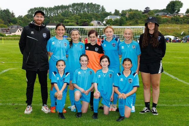 Central Girls’ under-12s team pose for a team picture