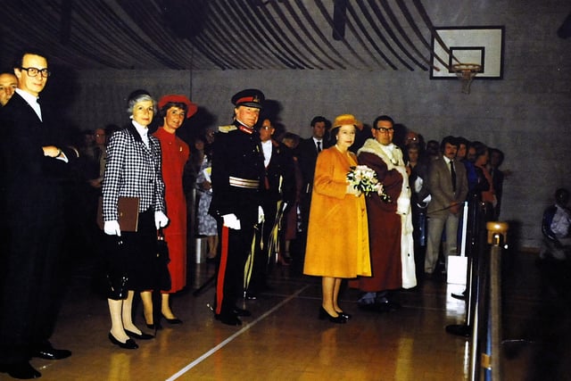 HM The Queen tours the centre accompanied by Provost John Docherty.