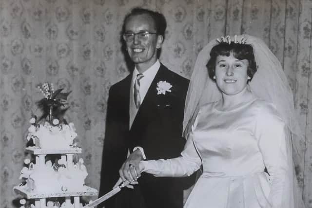 The happy couple cutting their wedding cake at the  Inchyra Grange Hotel on December 1, 1962